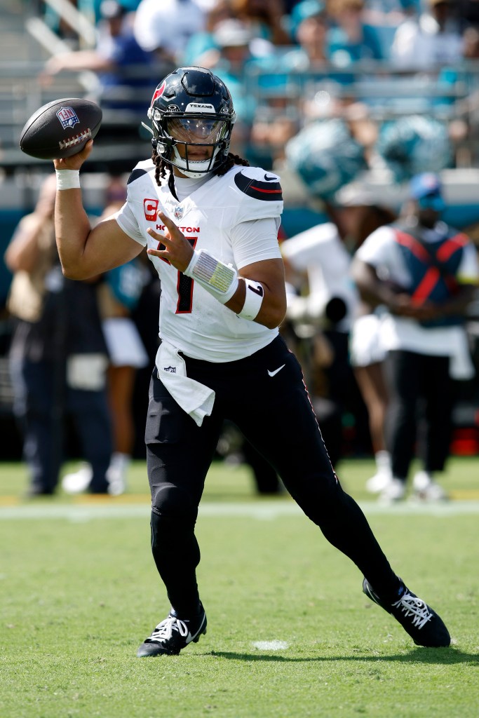 CJ Stroud of the Houston Texans looks to pass.