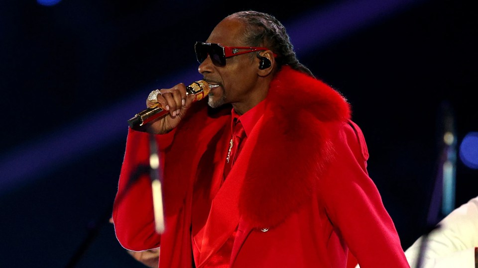 Snoop Dogg performs the halftime show during the game between the Minnesota Vikings and the Detroit Lions at U.S. Bank Stadium