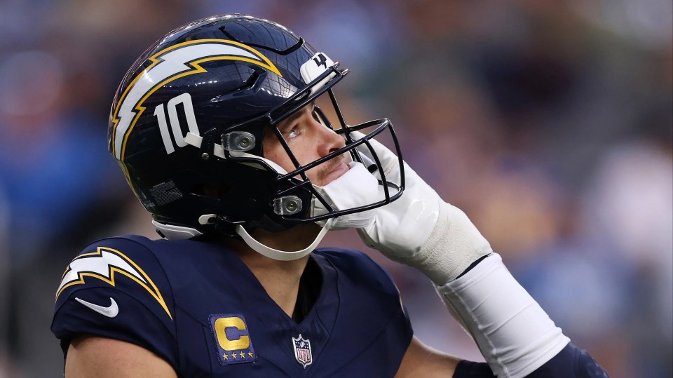 ustin Herbert #10 of the Los Angeles Chargers reacts after an incomplete pass in the first quarter against the Houston Texans at SoFi Stadium