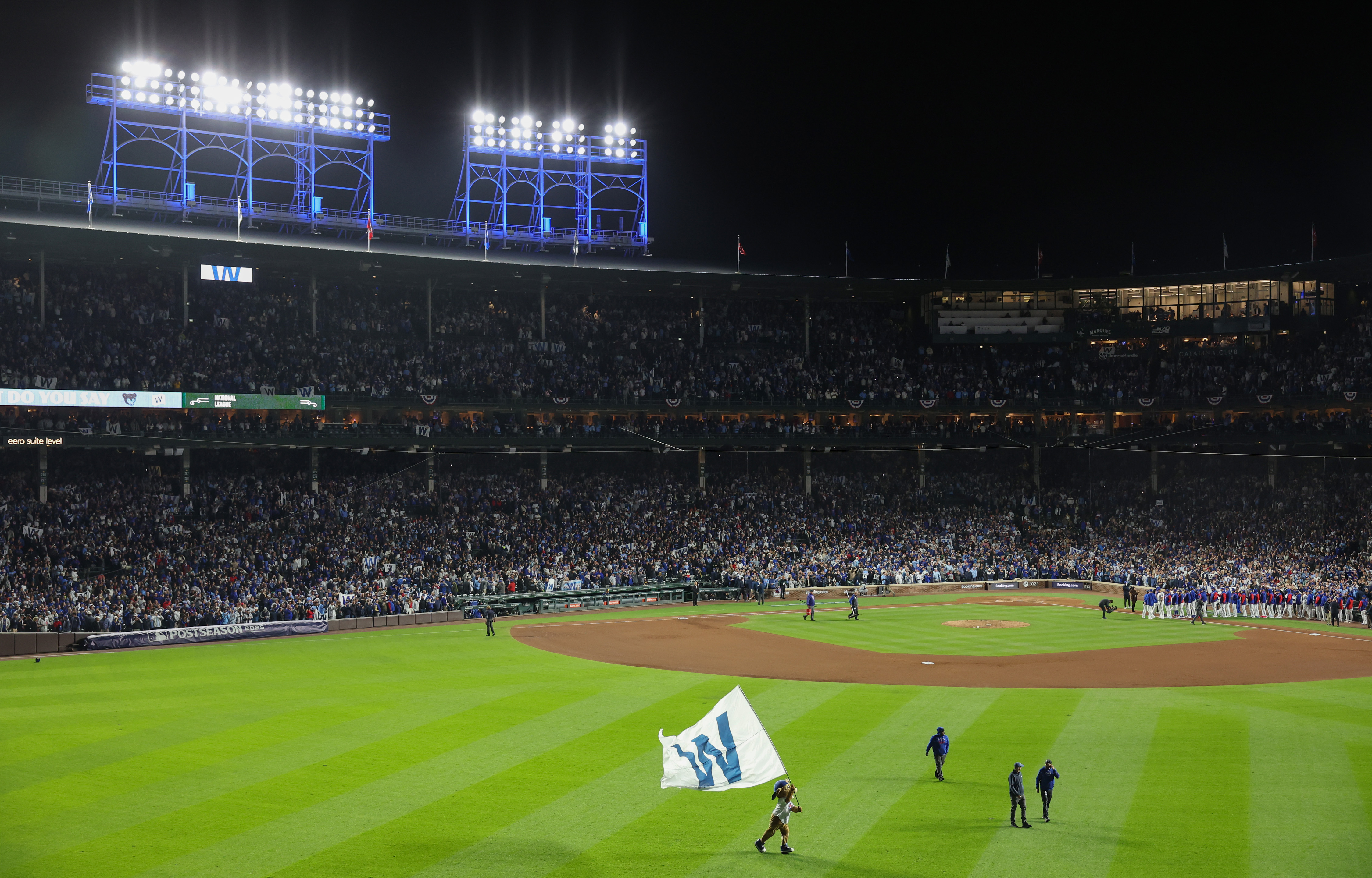 Cubs mascot Clark waves a 