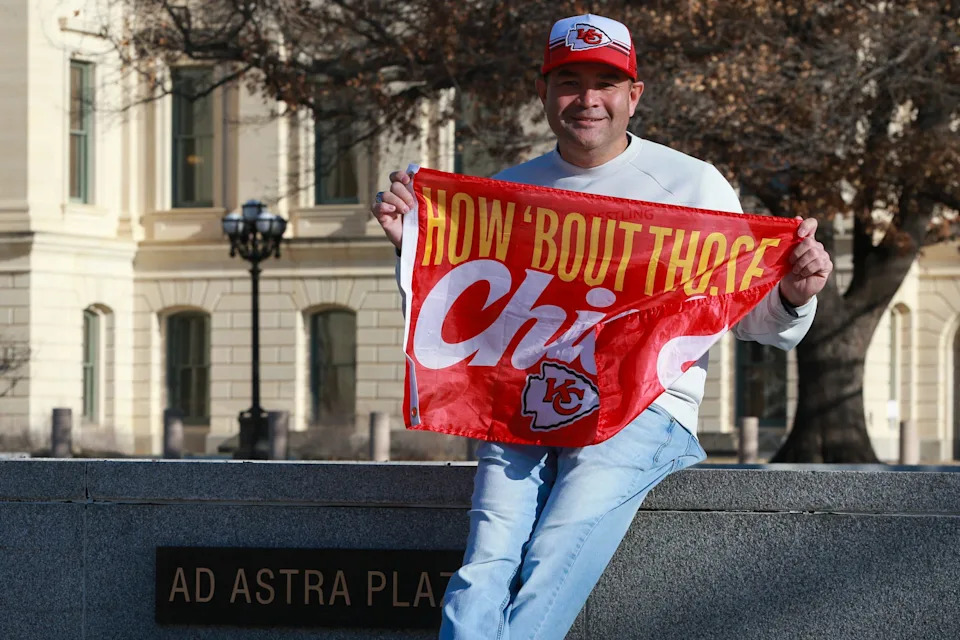 Topeka's Steve Bushnell sits outside the Robert B. Docking State Office Building. The Chiefs fan was outside to show his support for the team's move to Kansas.