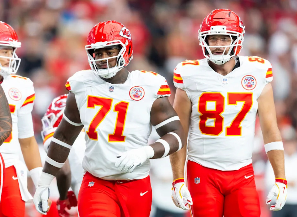 Kansas City Chiefs offensive tackle Josh Simmons (71) and tight end Travis Kelce (87) against the Arizona Cardinals during a preseason NFL game at State Farm Stadium.Mark J. Rebilas-Imagn Images