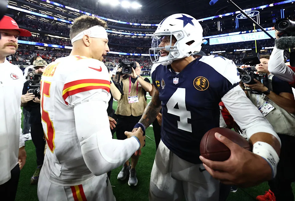 Nov 27, 2025; Arlington, Texas, USA; Kansas City Chiefs quarterback Patrick Mahomes (15) and Dallas Cowboys quarterback Dak Prescott (4) greet each other after the game at AT&T Stadium. Mandatory Credit: Kevin Jairaj-Imagn Images© Kevin Jairaj-Imagn Images&NewLine;&NewLine;