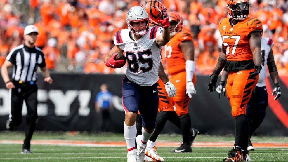 New England Patriots tight end Hunter Henry (85) celebrates in front of Cincinnati Bengals linebacker Germaine Pratt (57) after catching a pass for a first down during the second half of an NFL football game, Sunday, Sept. 8, 2024, in Cincinnati. (AP Photo/Jeff Dean)