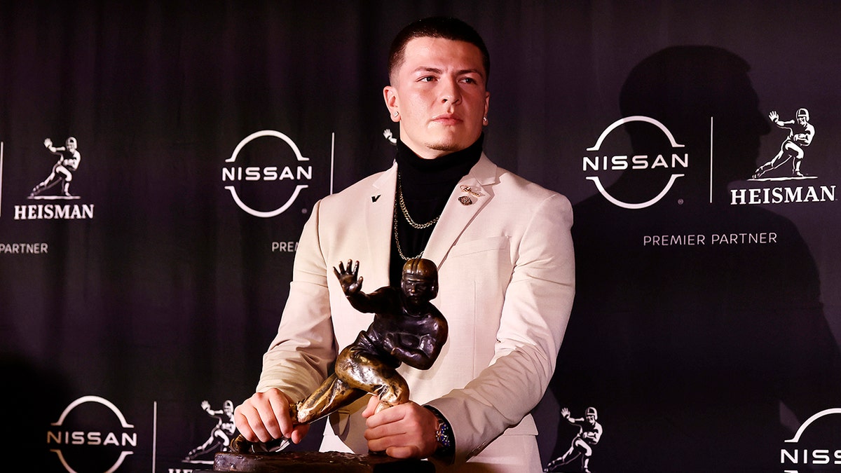 Diego Pavia holds Heisman Trophy