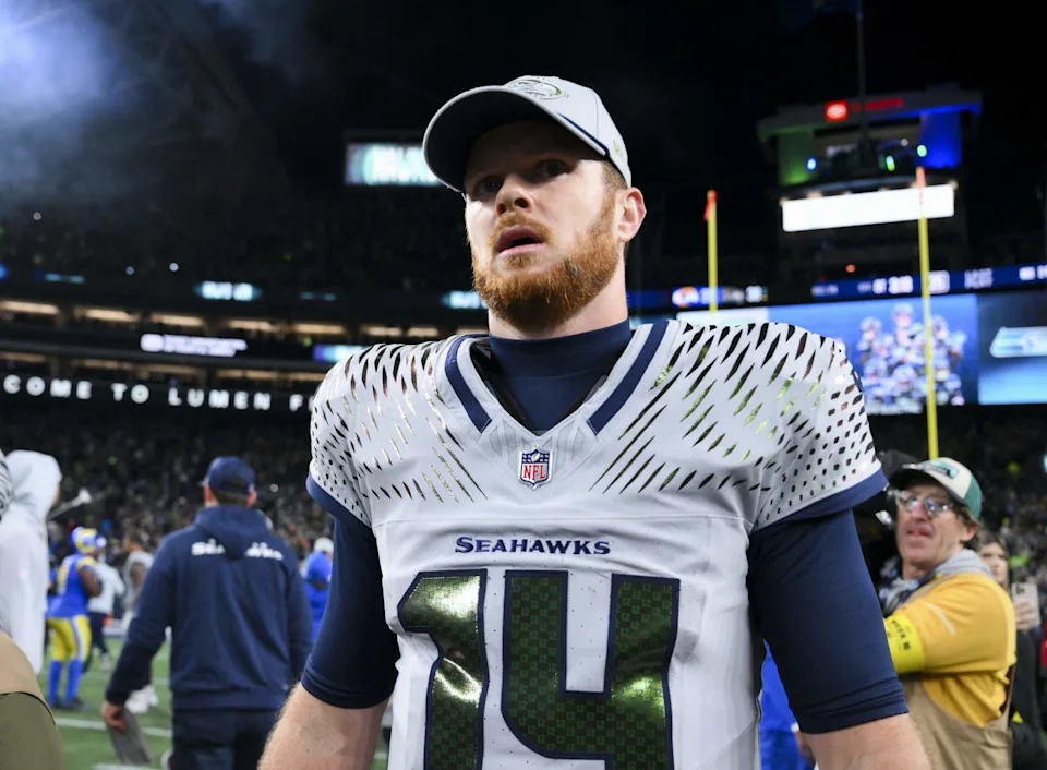 Seattle Seahawks quarterback Sam Darnold (14) walks off the field after the Seattle Seahawks 38-37 overtime victory at Lumen Field, on Thursday, Dec. 18, 2025, in Seattle.