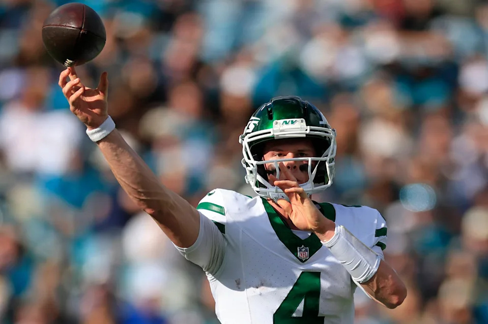 New York Jets quarterback Brady Cook (4) passes the ball during the second quarter of an NFL football matchup at EverBank Stadium, Sunday, Dec. 14, 2025, in Jacksonville, Fla. The Jaguars defeated the Jets 48-20. [Corey Perrine/Florida Times-Union]