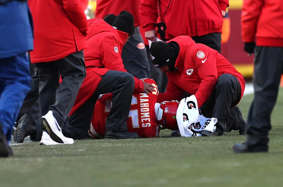 Jamie Squire/Getty Patrick Mahomes tears ACL during Chiefs-Chargers game on Dec. 14, 2025.