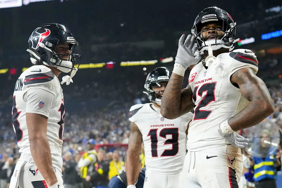 Houston Texans wide receiver Nico Collins (12) celebrates after scoring a touchdown Sunday, Nov. 30, 2025, during a game against the Indianapolis Colts at Lucas Oil Stadium in Indianapolis.