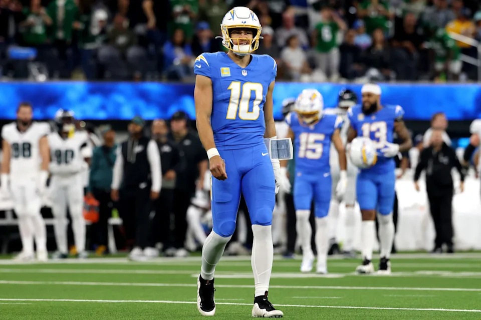 INGLEWOOD, CALIFORNIA - DECEMBER 08: Justin Herbert #10 of the Los Angeles Chargers reacts during the first quarter of a game against the Philadelphia Eagles at SoFi Stadium on December 08, 2025 in Inglewood, California. (Photo by Katelyn Mulcahy/Getty Images)