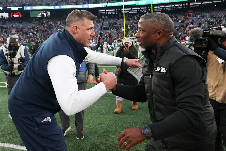 Dec 28, 2025; East Rutherford, New Jersey, USA; New England Patriots head coach Mike Vrabel and New York Jets head coach Aaron Glenn shake hands after the game at MetLife Stadium. Mandatory Credit: Vincent Carchietta-Imagn Images