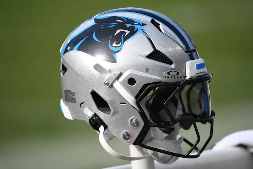Carolina Panthers helmet rests on the bench