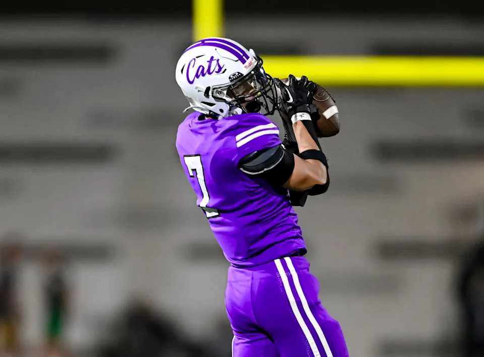 Muncie Central junior Kye Hiatt intercepts a pass during an IHSAA high school football game against Yorktown Friday, Aug. 29, 2025, at Muncie Central High School.