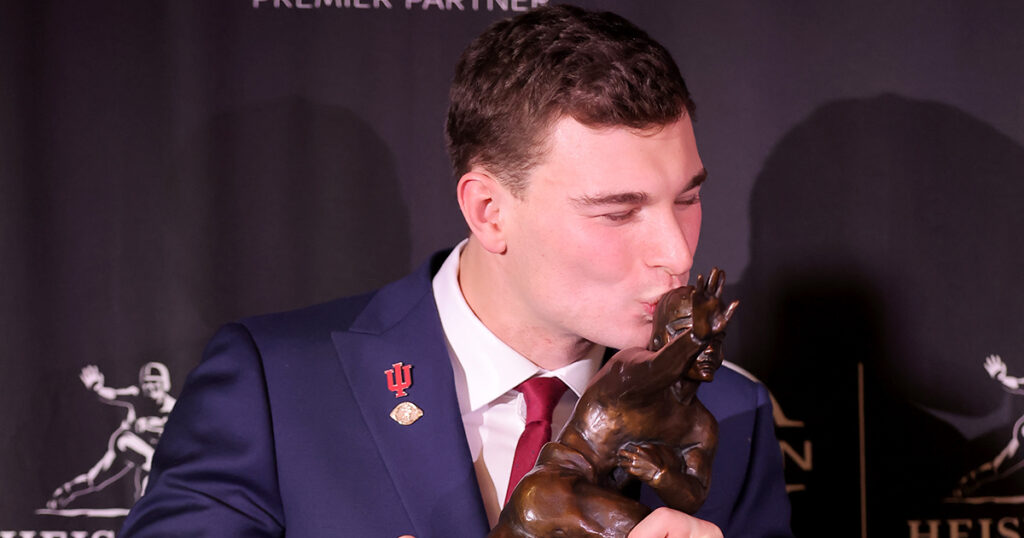 Indiana QB Fernando Mendoza with the Heisman Trophy