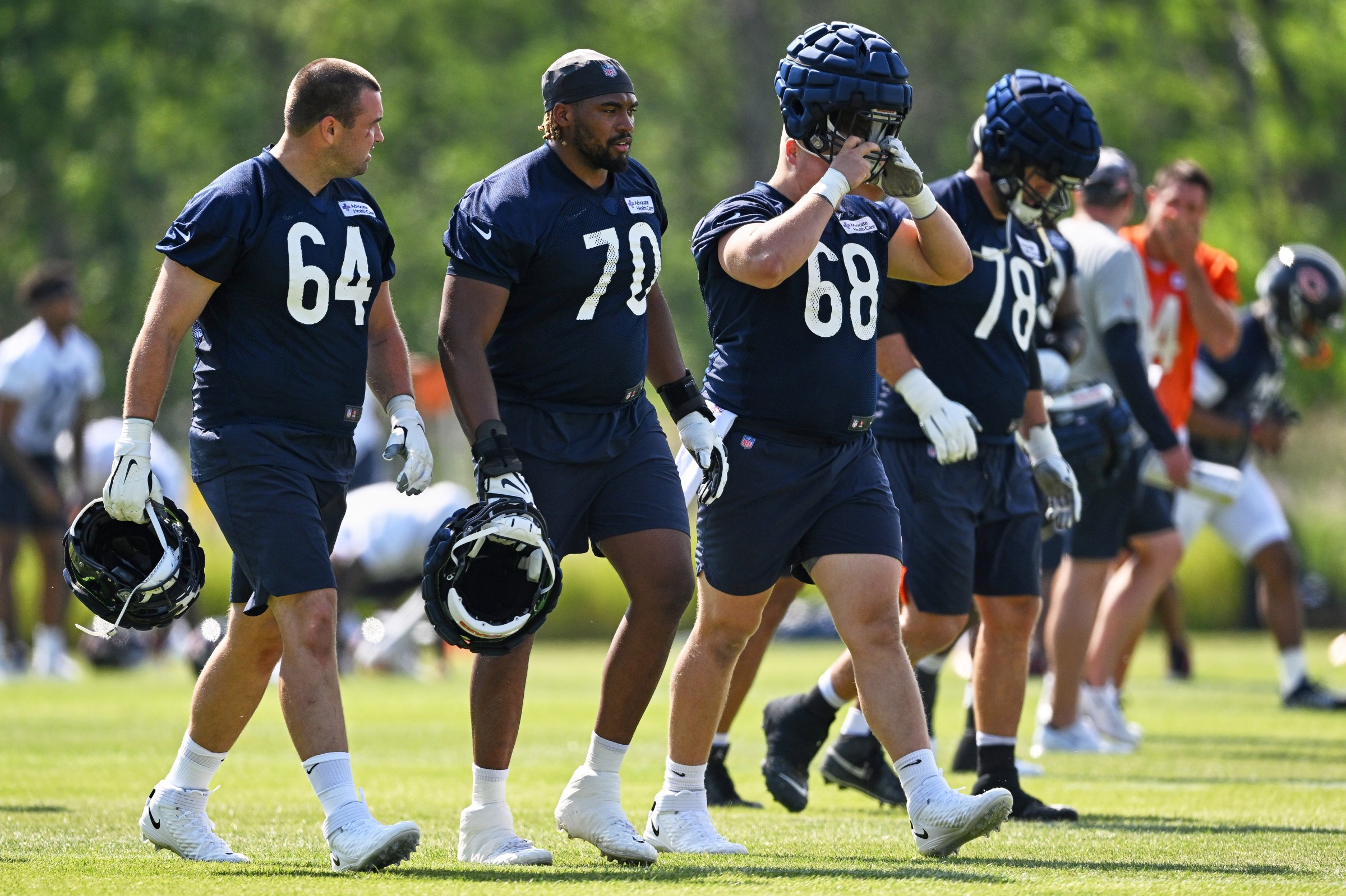 LAKE FOREST, IL - JULY 27: Chicago Bears offensive linemen Michael Schofield (64) and Braxton Jones (70) look on during the Chicago Bears Training Camp on July 27, 2022 at Halas Hall in Lake Forest, IL. (Photo by Robin Alam/Icon Sportswire via Getty Images)