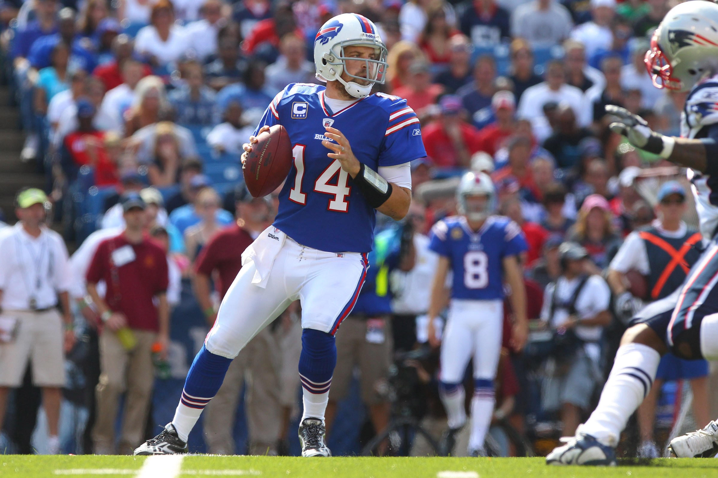 BUFFALO, NY - SEPTEMBER 25: Ryan Fitzpatrick #14 of the Buffalo Bills prepares to throw a pass during NFL game action against the New England Patriots at Ralph Wilson Stadium on September 25, 2011 in Orchard Park, New York. (Photo by Tom Szczerbowski/Getty Images)