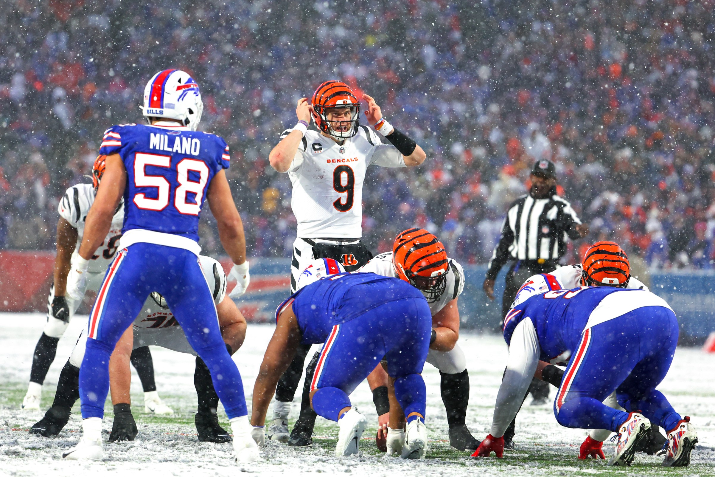 ORCHARD PARK, NEW YORK - JANUARY 22: Joe Burrow #9 of the Cincinnati Bengals looks on at the line of scrimmage against the Buffalo Bills during the second half in the AFC Divisional Playoff game at Highmark Stadium on January 22, 2023 in Orchard Park, New York. (Photo by Timothy T Ludwig/Getty Images)
