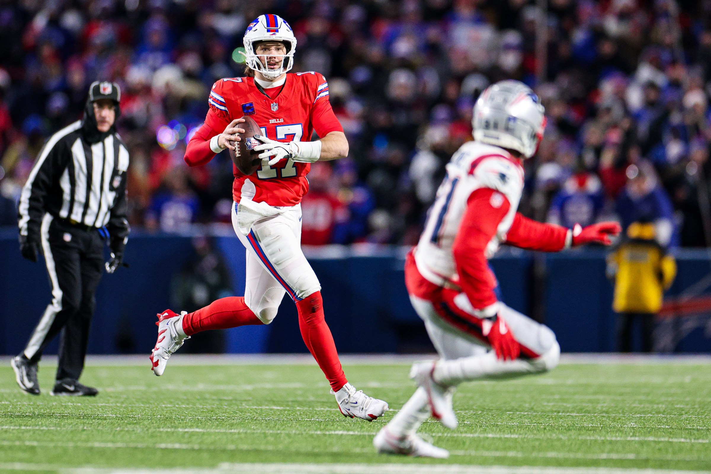 ORCHARD PARK, NEW YORK - DECEMBER 22: Josh Allen #17 of the Buffalo Bills looks to pass during the fourth quarter against the New England Patriots at Highmark Stadium on December 22, 2024 in Orchard Park, New York. (Photo by Bryan Bennett/Getty Images)