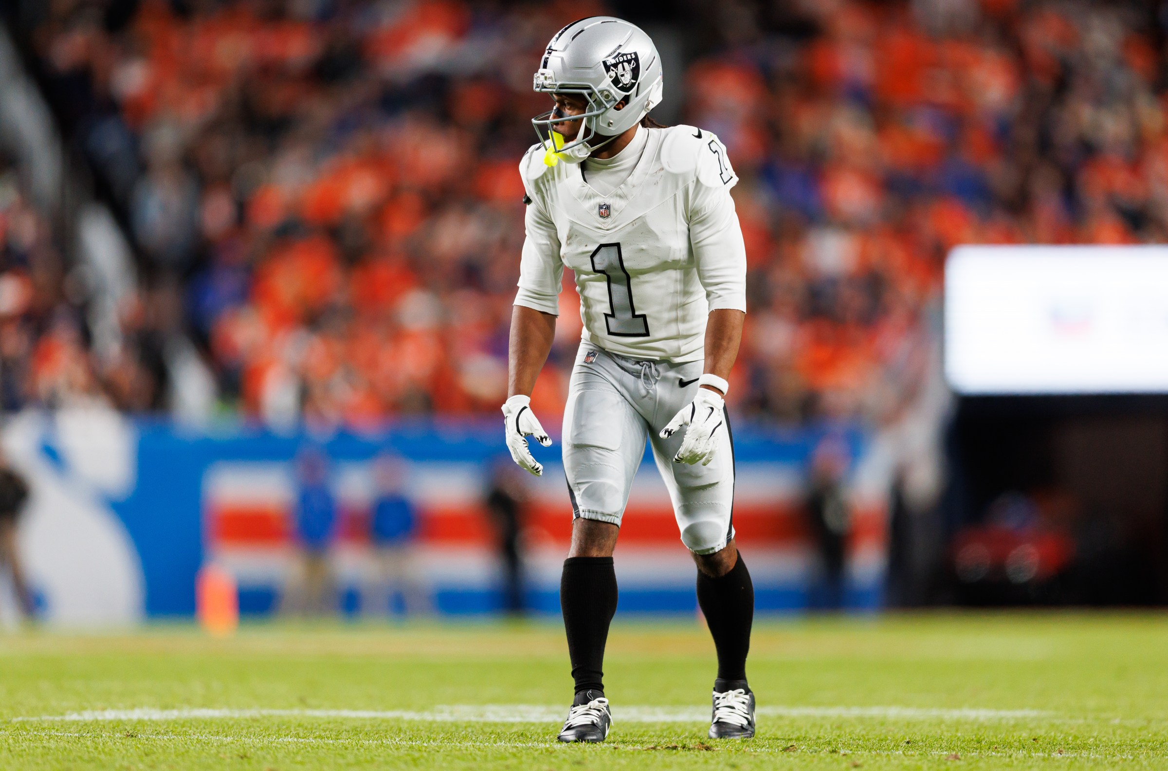 DENVER, COLORADO - NOVEMBER 6: Tre Tucker #1 of the Las Vegas Raiders gets set during the first half of an NFL football game against the Denver Broncos at Empower Field At Mile High on November 06, 2025 in Denver, Colorado. (Photo by Brooke Sutton/Getty Images)
