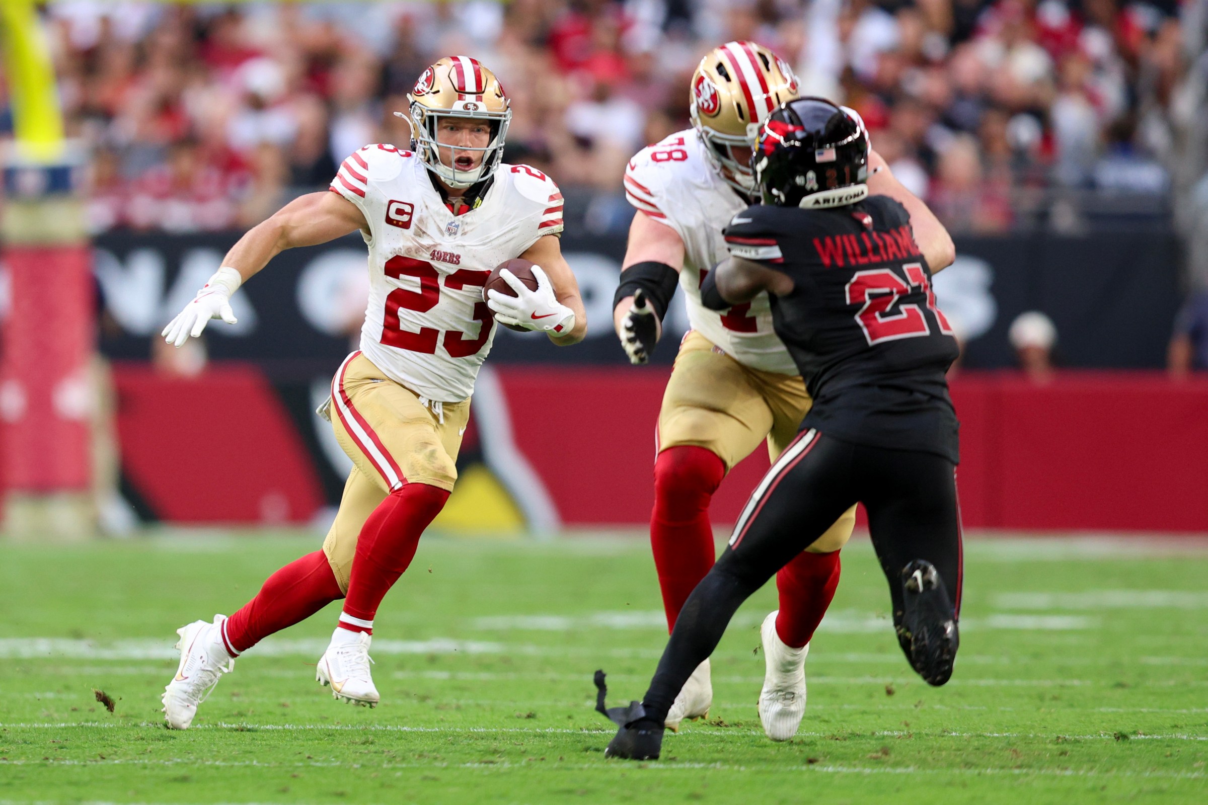 GLENDALE, ARIZONA - NOVEMBER 16: Christian McCaffrey #23 of the San Francisco 49ers carries the ball after a reception against the Arizona Cardinals during the third quarter at State Farm Stadium on November 16, 2025 in Glendale, Arizona. (Photo by Mike Christy/Getty Images)