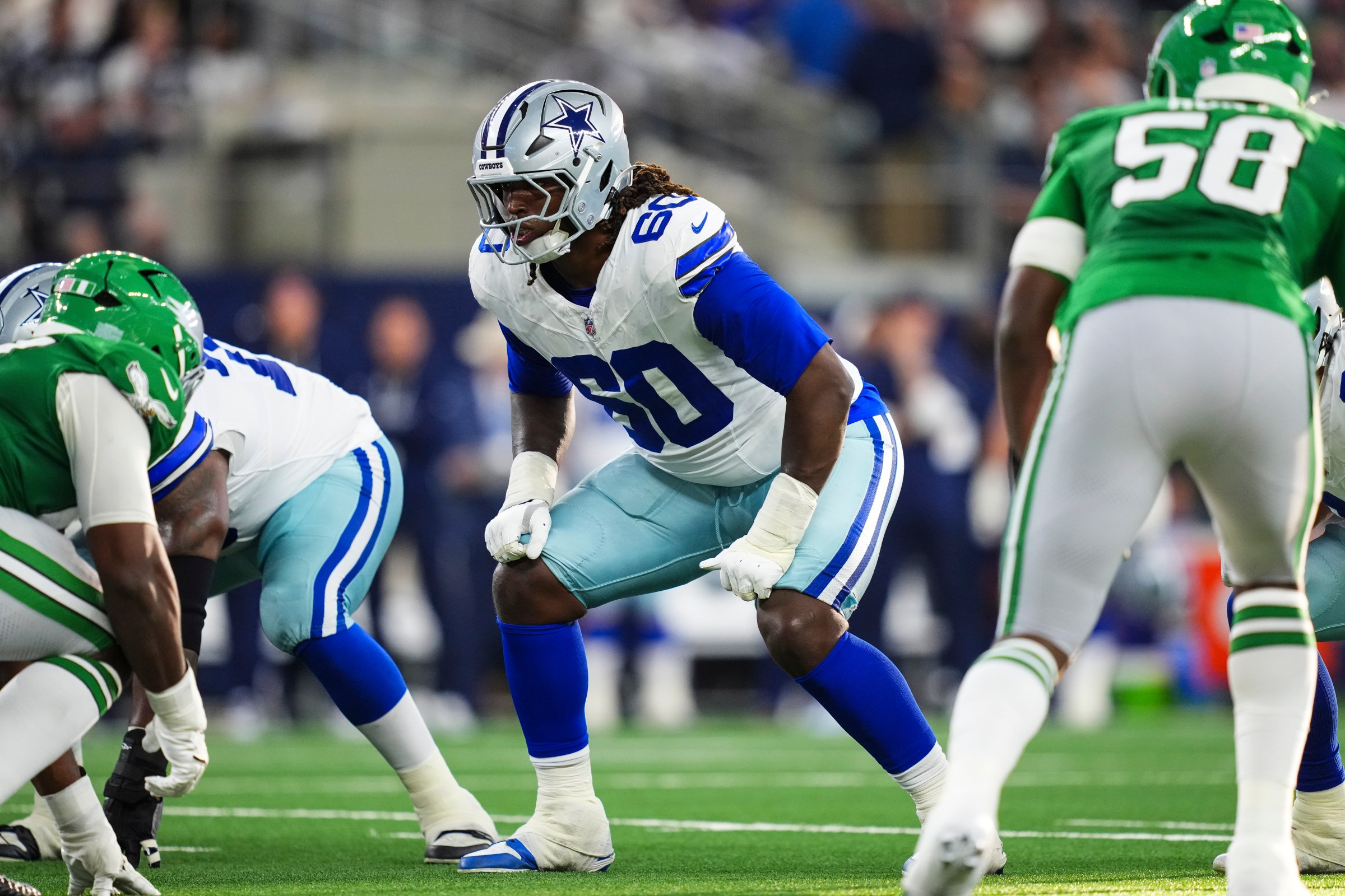 ARLINGTON, TX - NOVEMBER 23: Tyler Guyton #60 of the Dallas Cowboys lines up before the snap during an NFL football game against the Philadelphia Eagles at AT&T Stadium on November 23, 2025 in Arlington, Texas. (Photo by Cooper Neill/Getty Images)