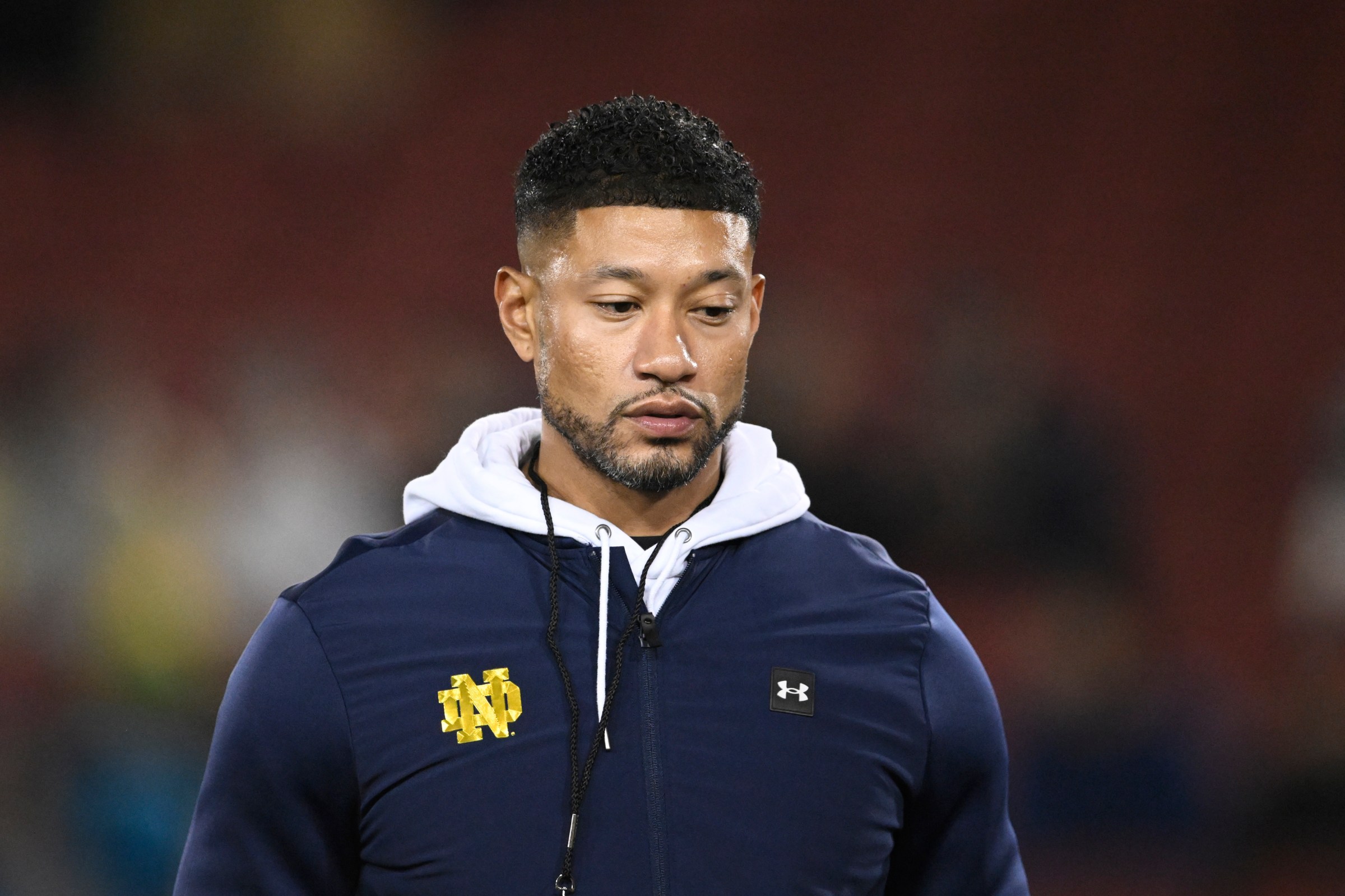 STANFORD, CALIFORNIA - NOVEMBER 29: Head coach Marcus Freeman of the Notre Dame Fighting Irish looks on during warm ups before the game against the Stanford Cardinal at Stanford Stadium on November 29, 2025 in Stanford, California. (Photo by Eakin Howard/Getty Images)
