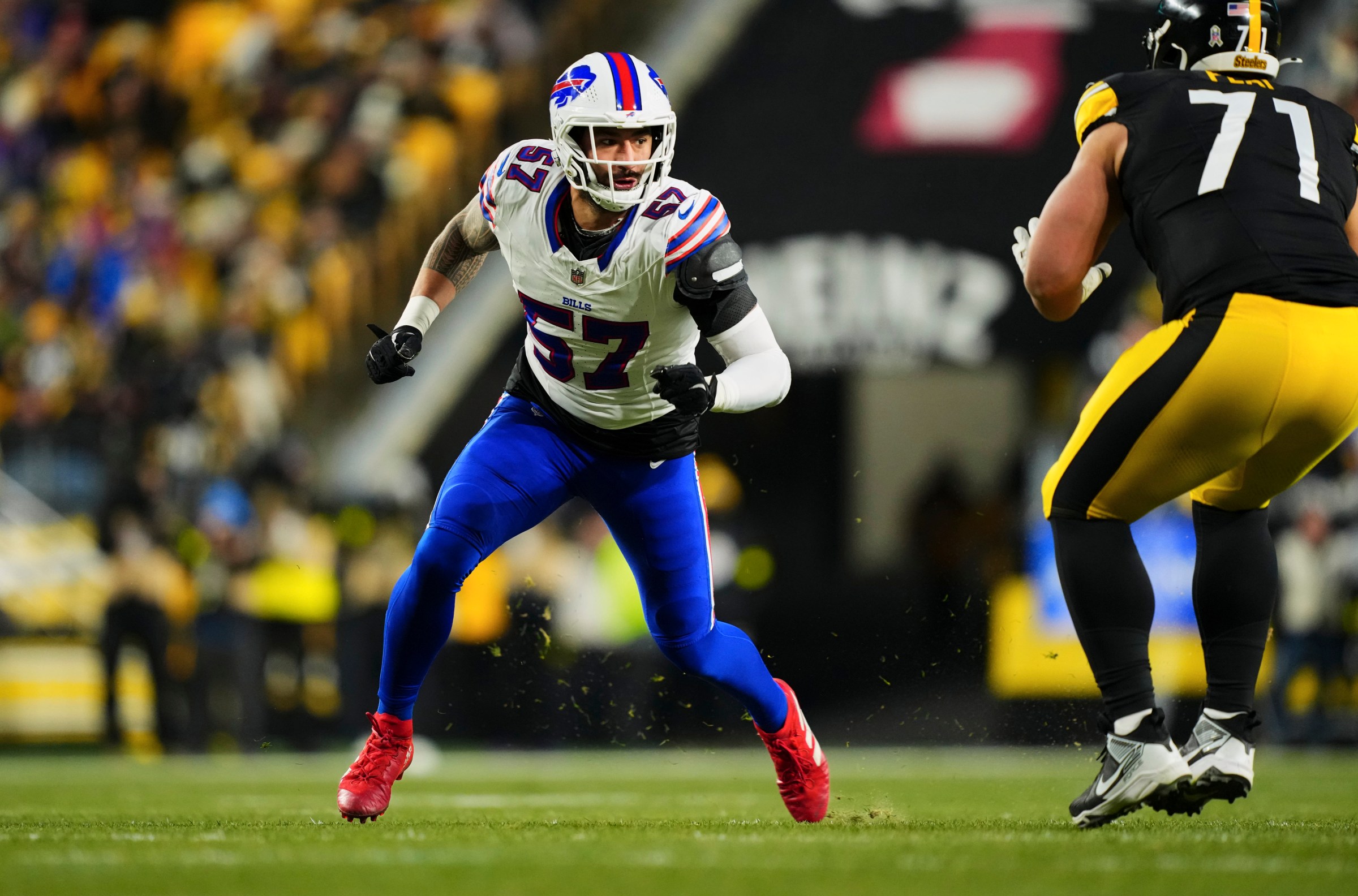 PITTSBURGH, PA - NOVEMBER 30: A.J. Epenesa #57 of the Buffalo Bills defends against the Pittsburgh Steelers during an NFL football game at Acrisure Stadium on November 30, 2025 in Pittsburgh, Pennsylvania. (Photo by Cooper Neill/Getty Images)
