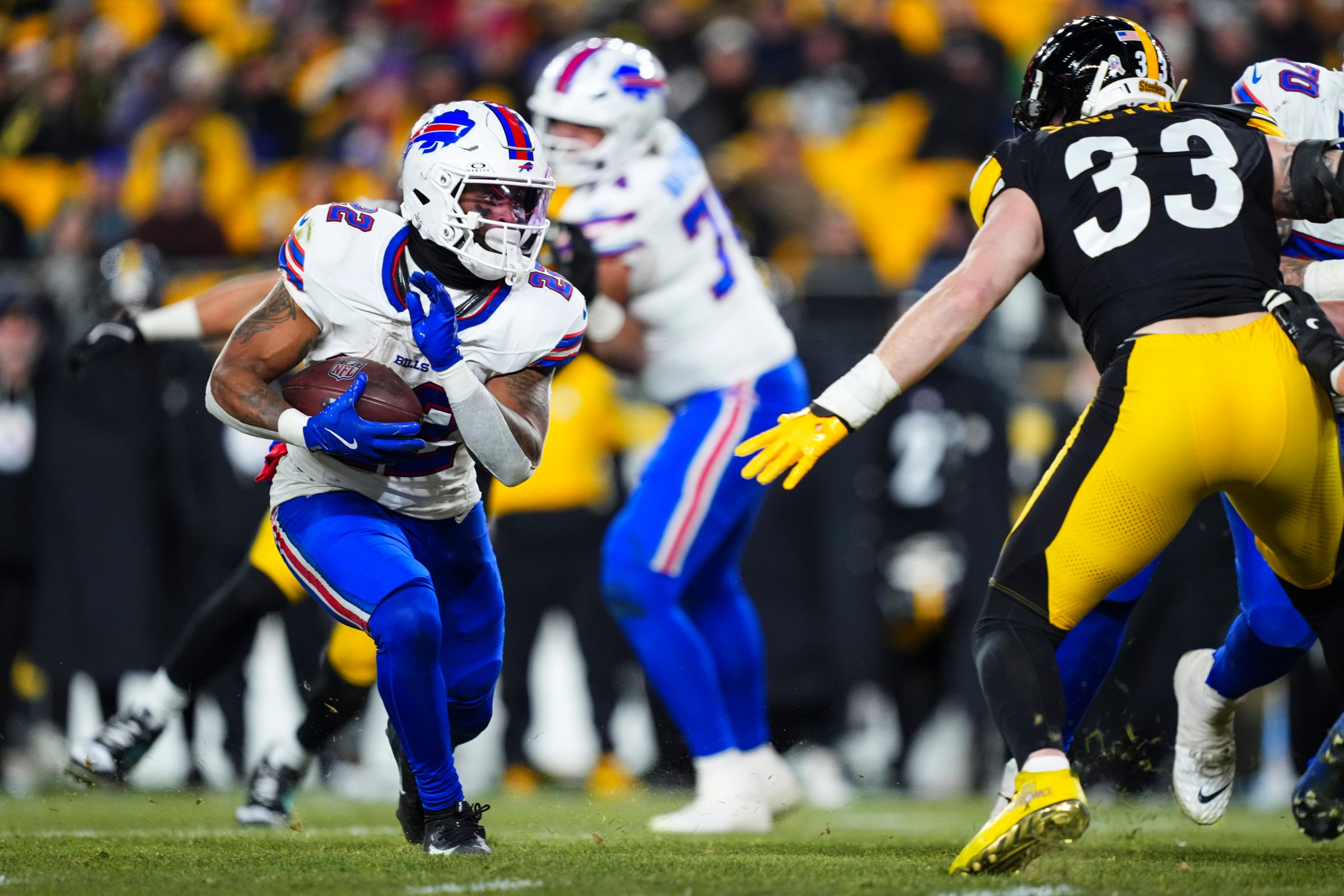 PITTSBURGH, PA - NOVEMBER 30: Ray Davis #22 of the Buffalo Bills runs the ball during an NFL football game against the Pittsburgh Steelers at Acrisure Stadium on November 30, 2025 in Pittsburgh, Pennsylvania. (Photo by Cooper Neill/Getty Images)
