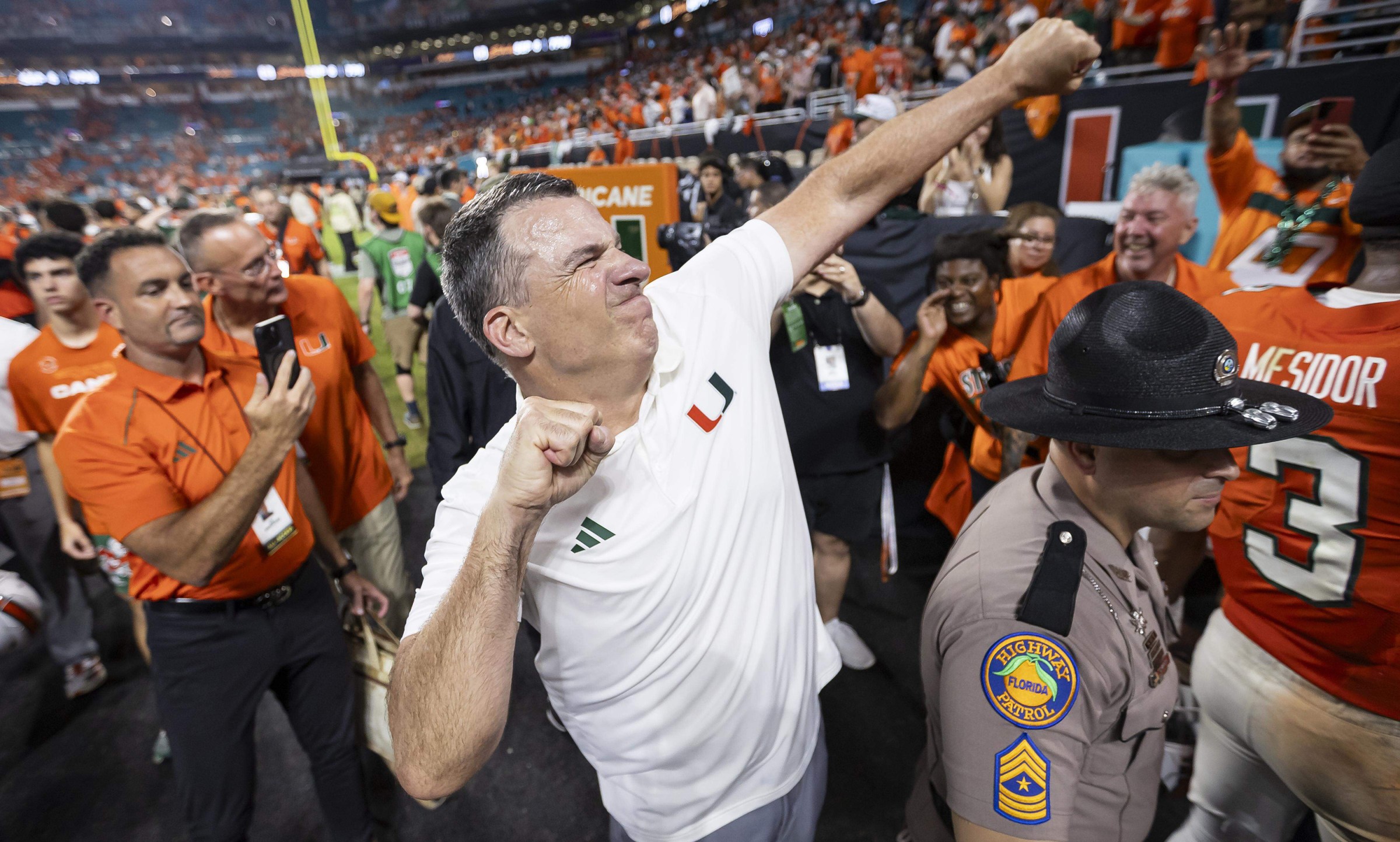 Miami Hurricanes head coach Mario Cristobal celebrates after his team defeated the Notre Dame Fighting Irish in their NCAA football game at Hard Rock Stadium on Sunday, Aug. 31, 2025, in Miami Gardens, Florida. (Matias J. Ocner/Miami Herald/Tribune News Service via Getty Images)