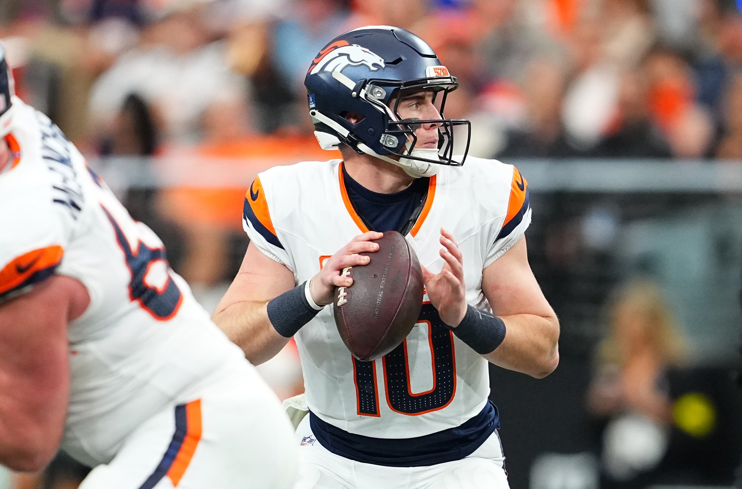 LAS VEGAS, NEVADA - DECEMBER 07: Bo Nix #10 of the Denver Broncos looks to pass during the second quarter against the Las Vegas Raiders at Allegiant Stadium on December 07, 2025 in Las Vegas, Nevada. (Photo by Chris Unger/Getty Images)