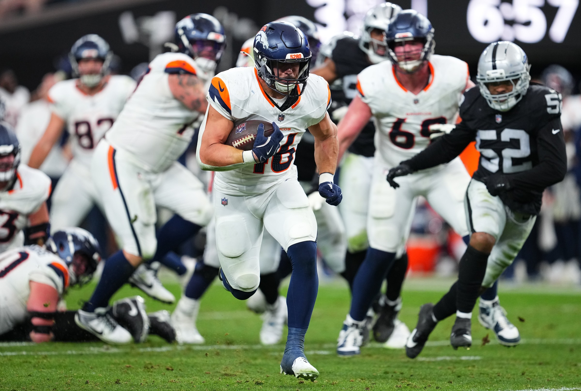 LAS VEGAS, NEVADA - DECEMBER 07: Adam Prentice #46 of the Denver Broncos runs with the ball during the third quarter against the Las Vegas Raiders at Allegiant Stadium on December 07, 2025 in Las Vegas, Nevada. (Photo by Chris Unger/Getty Images)
