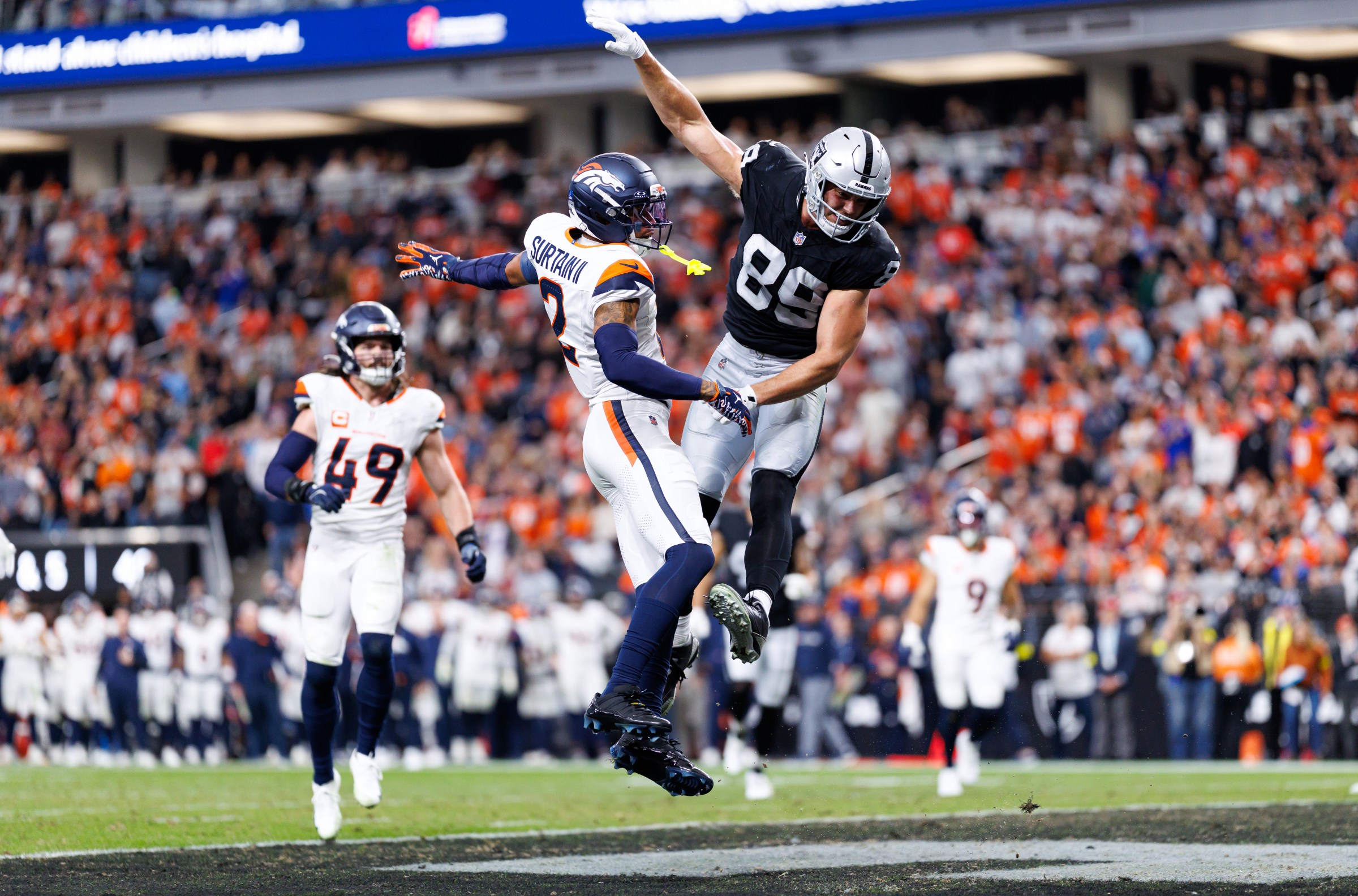 LAS VEGAS, NEVADA - DECEMBER 7: Pat Surtain II #2 of the Denver Broncos deflects a touchdown pass intended for Brock Bowers #89 of the Las Vegas Raiders during the fourth quarter of an NFL football game at Allegiant Stadium on December 07, 2025 in Las Vegas, Nevada. (Photo by Brooke Sutton/Getty Images)