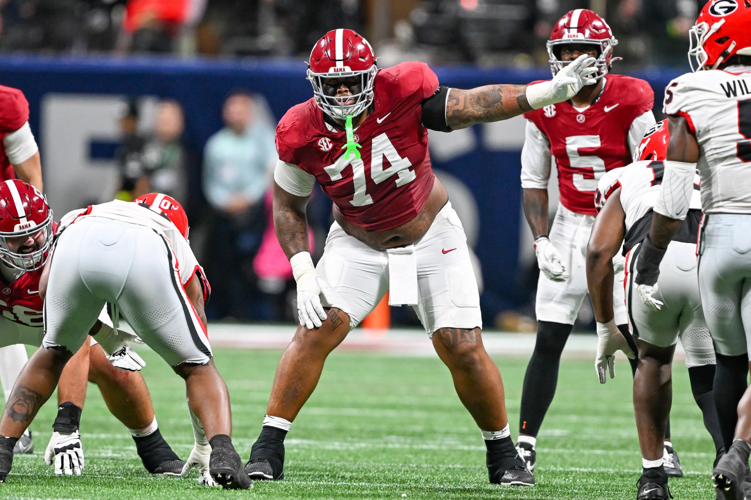 ATLANTA, GA - DECEMBER 06: Alabama offensive lineman Kadyn Proctor (74) reacts during the SEC Championship college football game between the Alabama Crimson Tide and the Georgia Bulldogs on December 6th, 2025 at Mercedes-Benz Stadium in Atlanta, GA. (Photo by Rich von Biberstein/Icon Sportswire via Getty Images)