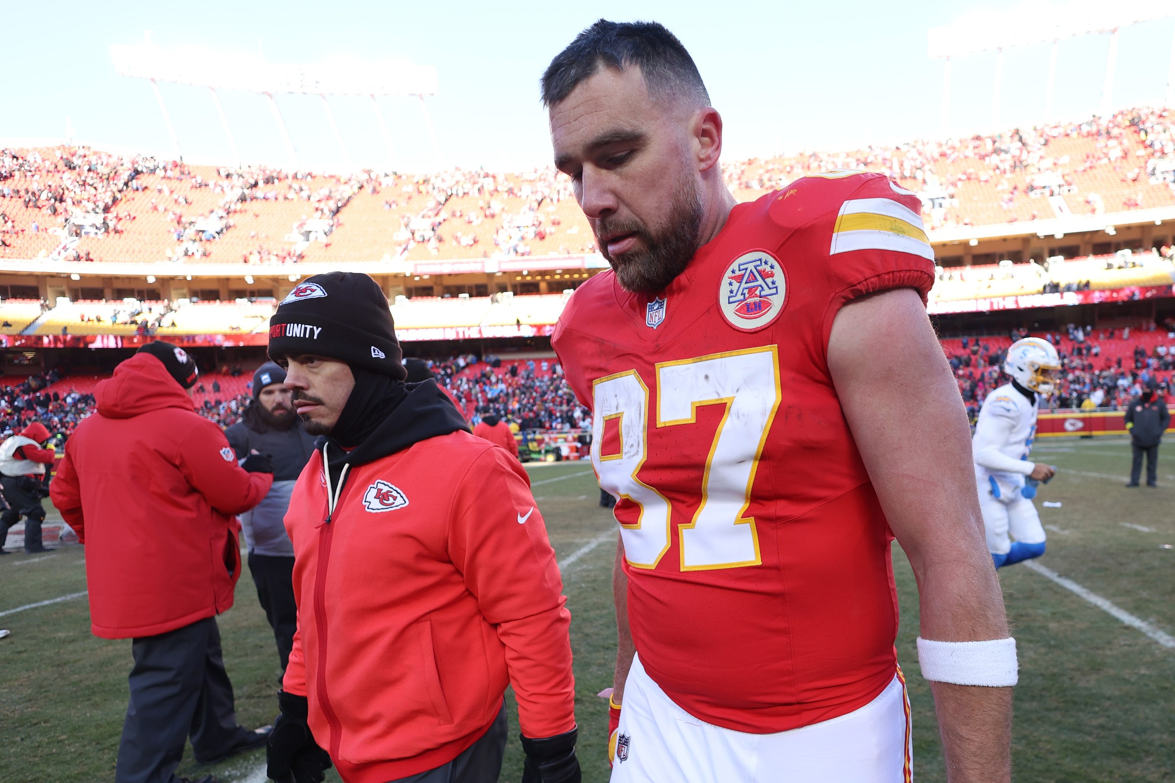 KANSAS CITY, MISSOURI - DECEMBER 14: Travis Kelce #87 of the Kansas City Chiefs walks of the field after losing to the Los Angeles Chargers 16-13 at Arrowhead Stadium on December 14, 2025 in Kansas City, Missouri. (Photo by Jamie Squire/Getty Images)