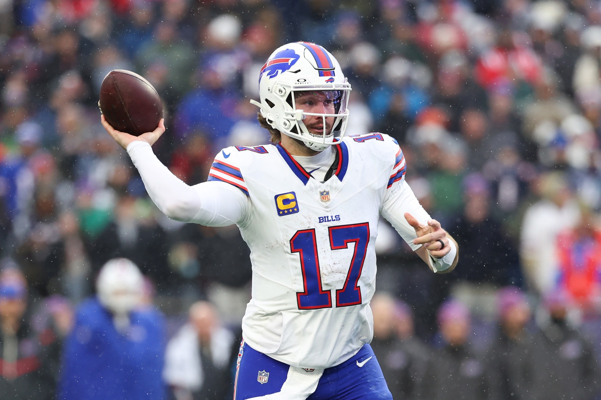 FOXBOROUGH, MASSACHUSETTS - DECEMBER 14: Josh Allen #17 of the Buffalo Bills throws the ball against the New England Patriots at Gillette Stadium on December 14, 2025 in Foxborough, Massachusetts. (Photo by Jordan Bank/Getty Images)