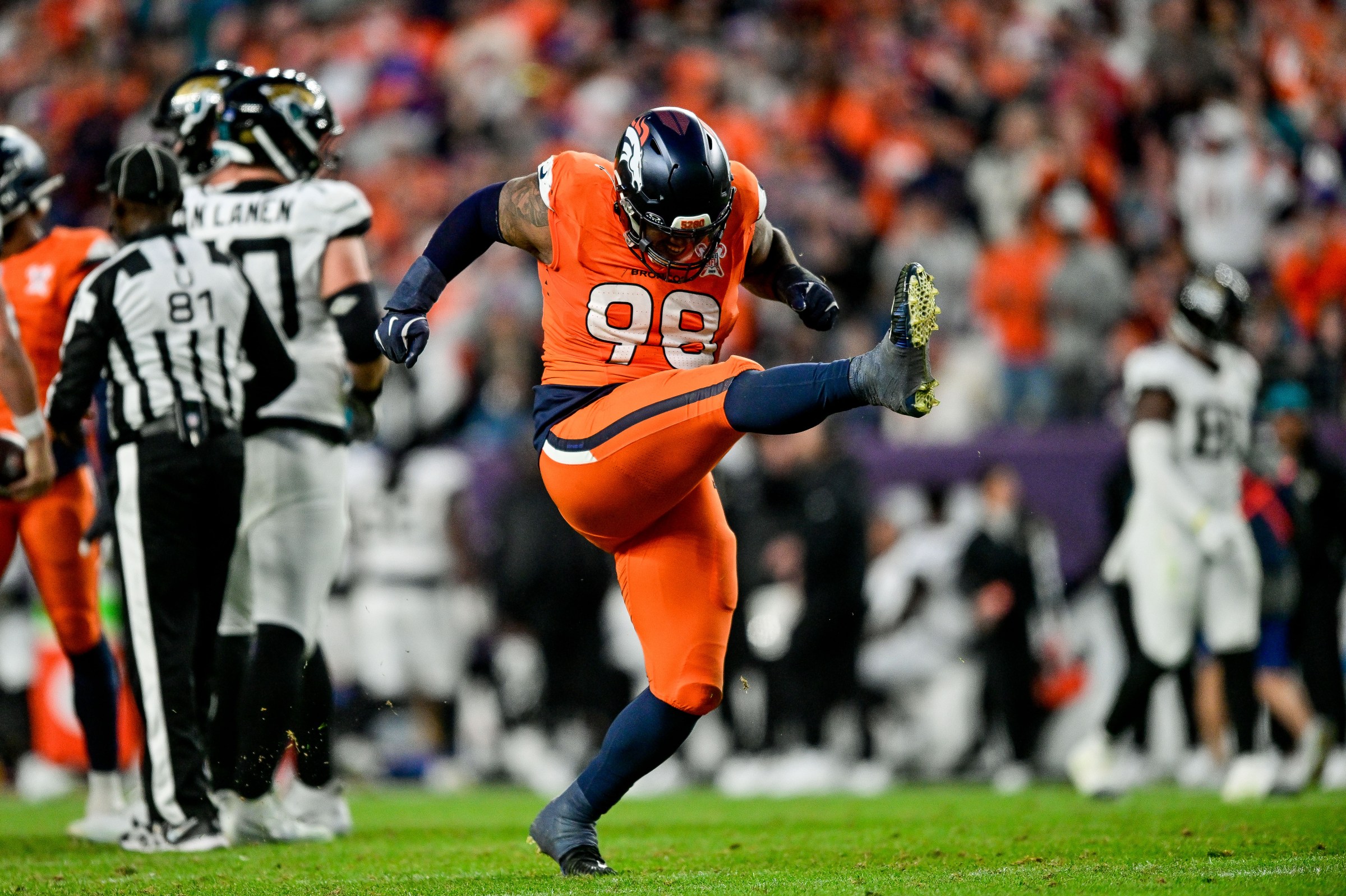 DENVER, CO - DECEMBER 21: Denver Broncos defensive end John Franklin-Myers (98) celebrates after a fourth quarter sack during a game between the Jacksonville Jaguars and the Denver Broncos at Empower Field at Mile High on December 21, 2025 in Denver, Colorado. (Photo by Dustin Bradford/Icon Sportswire via Getty Images)