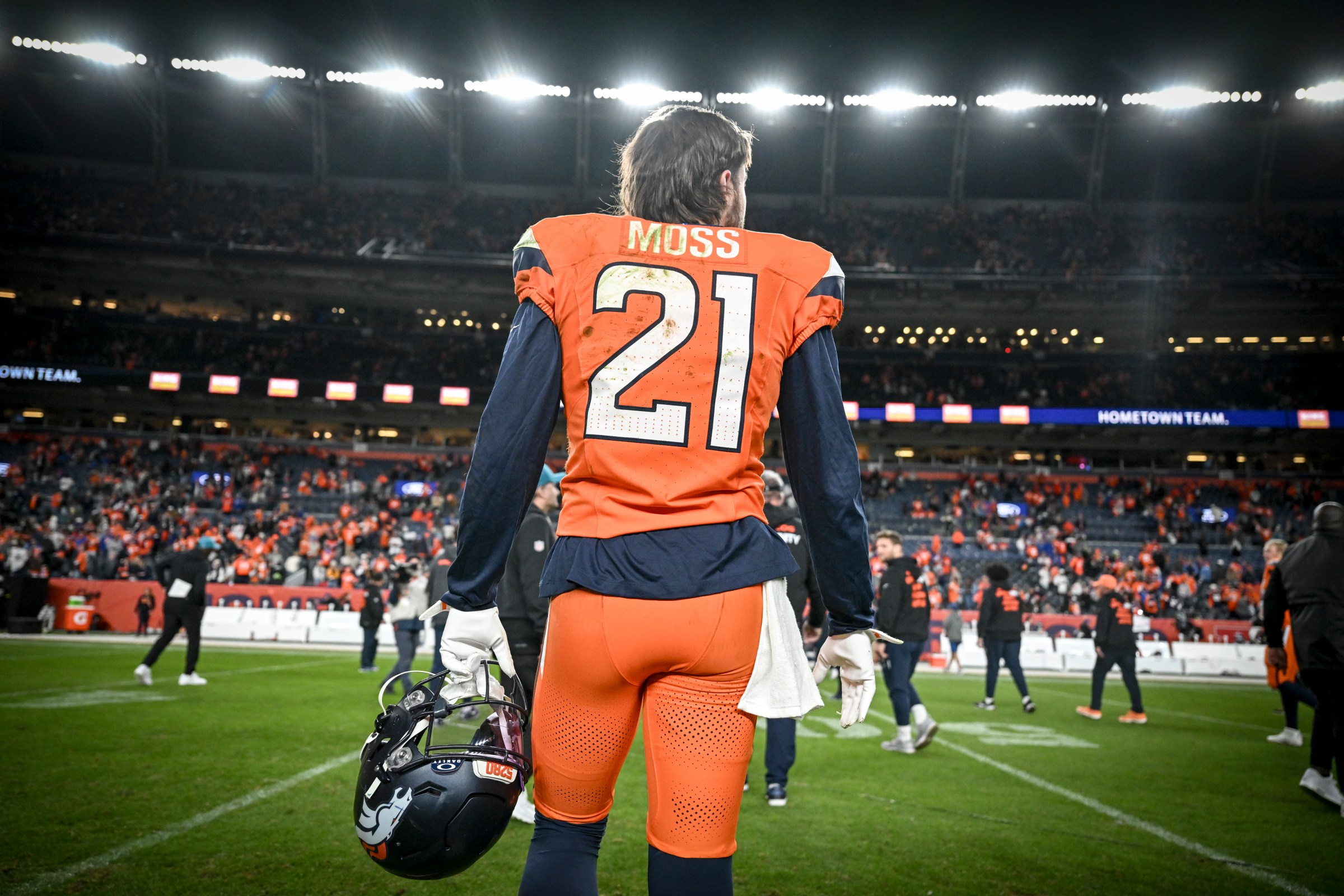 DENVER , CO - DECEMBER 21: Riley Moss (21) of the Denver Broncos leaves the field after the Jacksonville Jaguars’ 34-20 win at Empower Field at Mile High in Denver, Colorado on Sunday, December 21, 2025. (Photo by AAron Ontiveroz/The Denver Post)