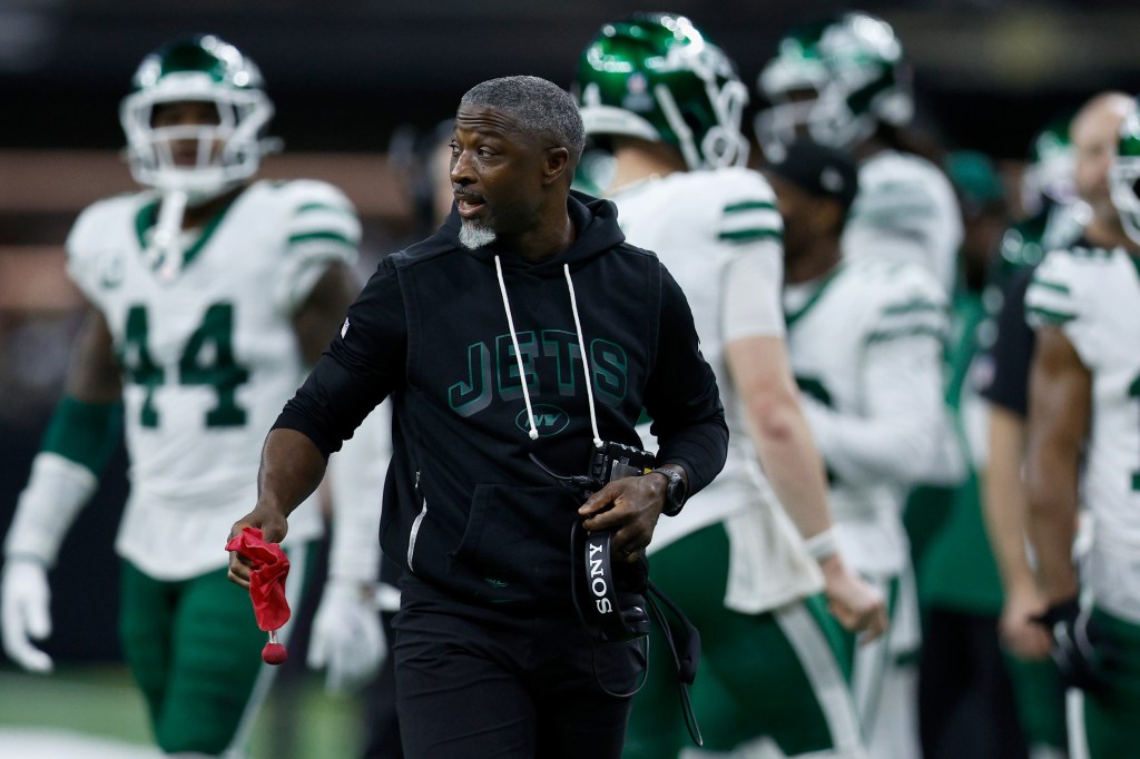 Head coach Aaron Glenn of the New York Jets challenges a play against the New Orleans Saints in the fourth quarter of a game at Caesars Superdome on December 21, 2025 in New Orleans, Louisiana.
