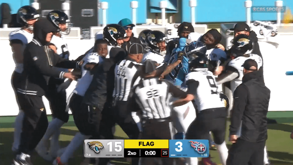 A helmet is ripped off in a fight betwee the Texans and Jaguars after a late hit on Trevor Lawrence seems to spark the brawl.