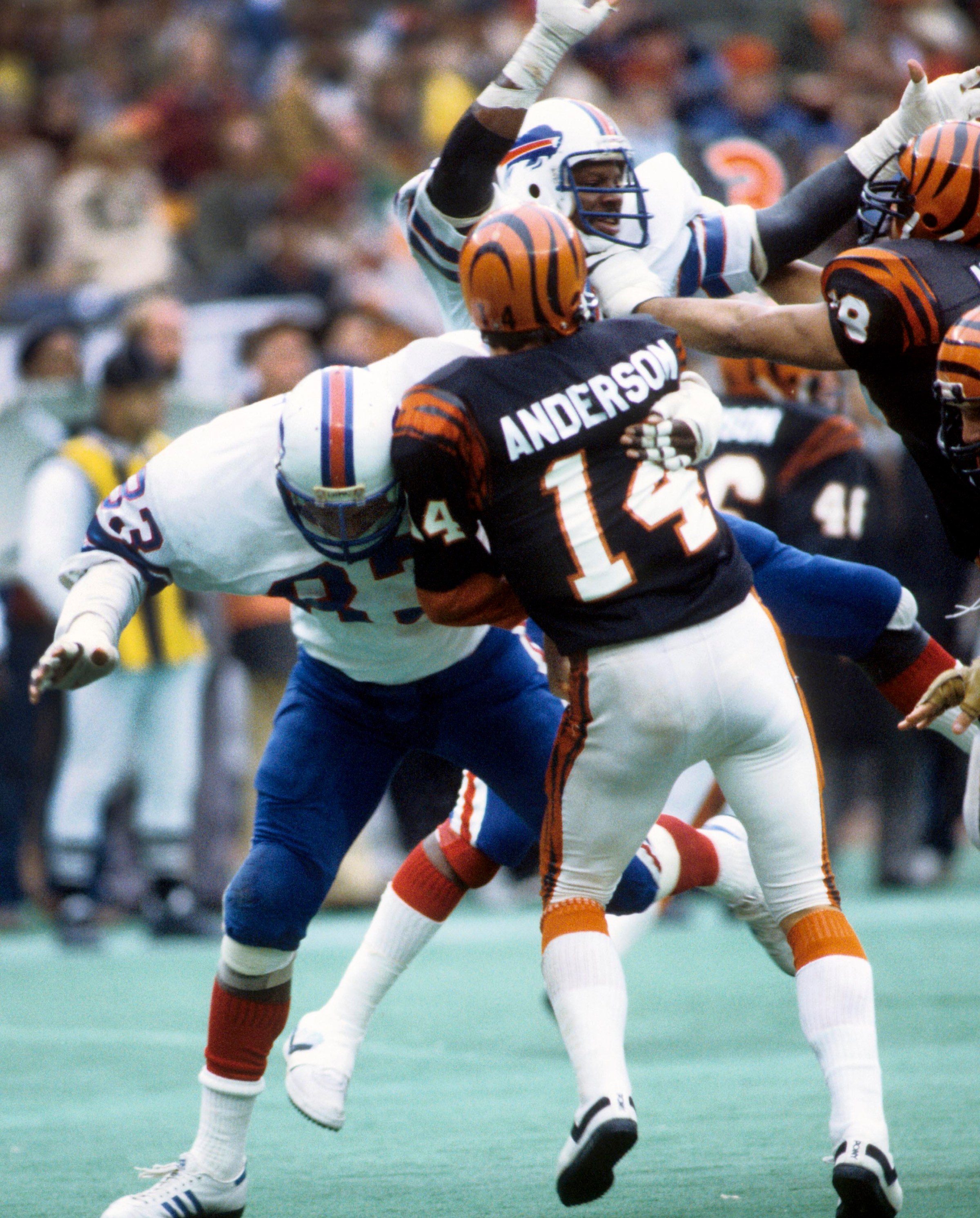 Jan 3, 1982; Cincinnati, OH, USA; FILE PHOTO; Buffalo Bills defensive end Ken Johnson (91) and Sherman White (83) pressure Cincinnati Bengals quarterback Ken Anderson (14) during the 1982 AFC Divisional Playoff game at Riverfront Stadium. The Bengals defeated the Bills 28-21. Mandatory Credit: Manny Rubio-Imagn Images