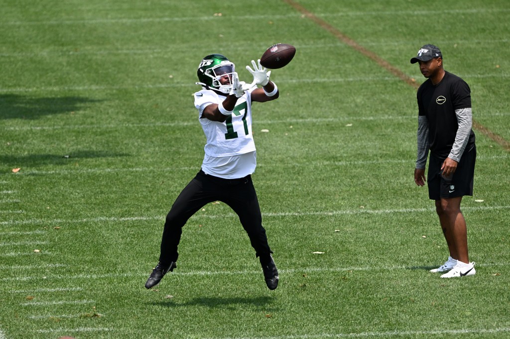 Jets cornerback Kris Boyd (17) catches a football during minicamp.