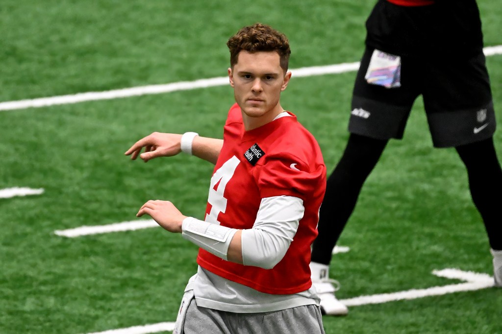 Jets quarterback Brady Cook (4) stretches at practice in Florham Park, NJ. 