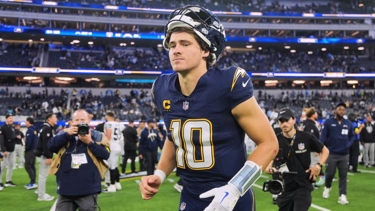Los Angeles Chargers quarterback Justin Herbert (10) walks off the field after an NFL football game against the Las Vegas Raiders, Sunday, Nov. 30, 2025, in Inglewood, Calif. (AP Photo/Jae C. Hong)