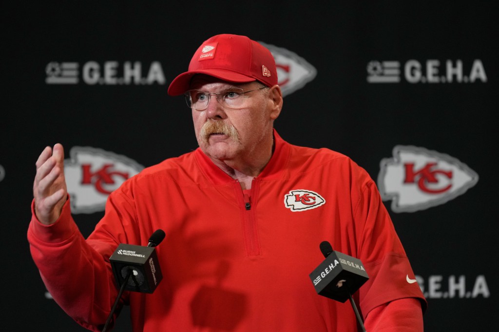 Kansas City Chiefs head coach Andy Reid talks to reporters.