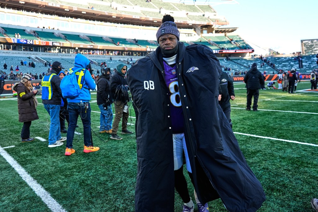 Baltimore Ravens quarterback Lamar Jackson (8) walks off the field after a win against the Cincinnati Bengals.