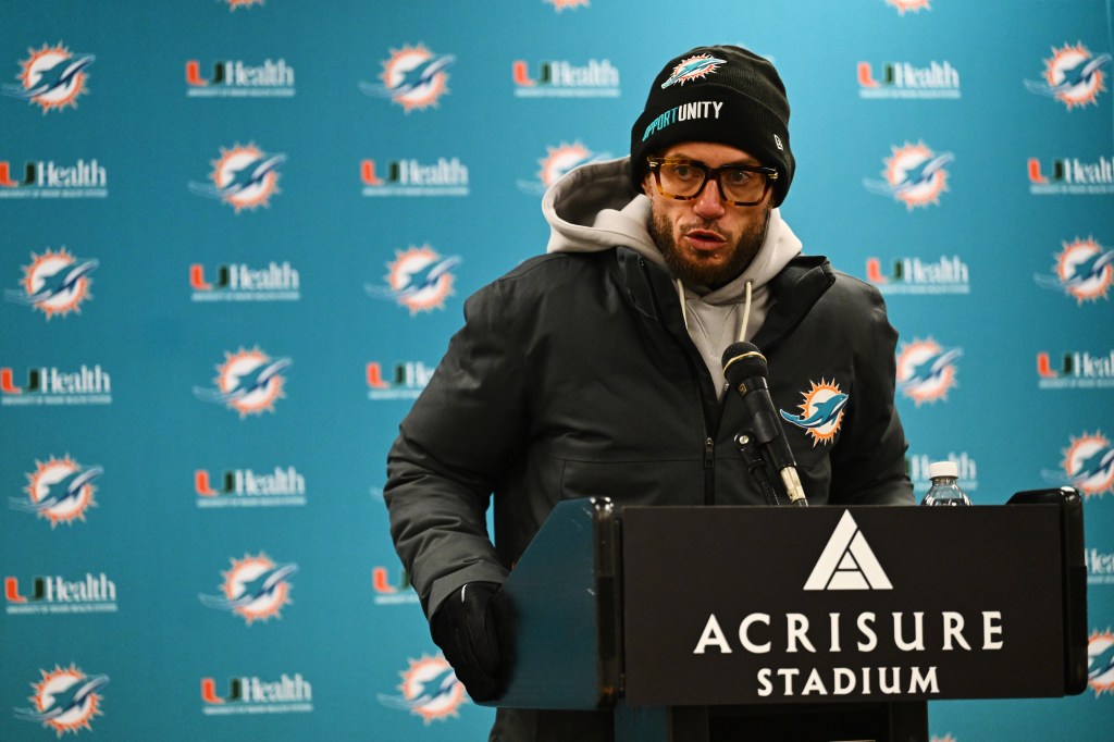 Miami Dolphins head coach Mike McDaniel responds to a question during a news conference.