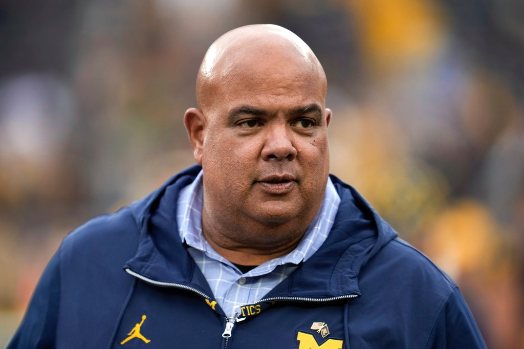 Warde Manuel watches in the second half of an NCAA college football game against UNLV in Ann Arbor, Mich., Sept. 9, 2023. 