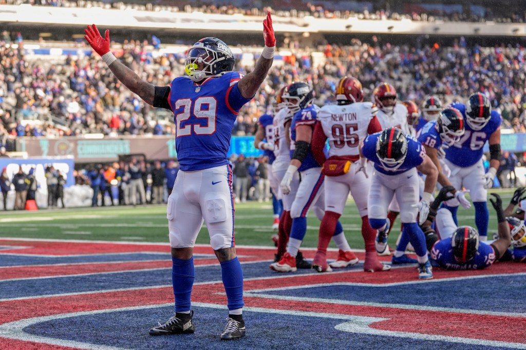 New York Giants running back Tyrone Tracy Jr. (29) reacts after scoring a touchdown.
