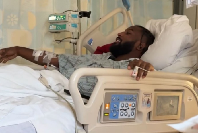 New York Jets player Kris Boyd is seen in his hospital bed in a photo he posted to his Instagram stories Wednesday, Nov. 19, 2025.