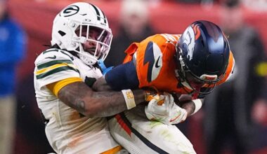 Green Bay Packers' Keisean Nixon tries to stop Denver Broncos' Troy Franklin during the second half of an NFL football game Sunday, Dec. 14, 2025, in Denver.